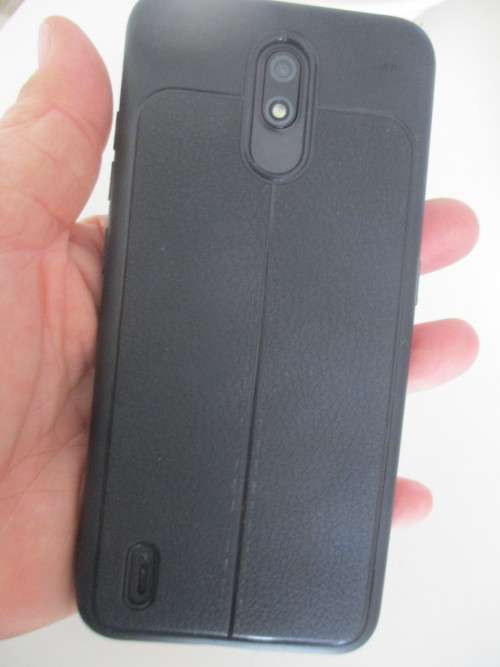 LOVELY SECOND HAND C1 NOKIA PHONE IN WORKING ORDER WITH COVER AND CHARGER