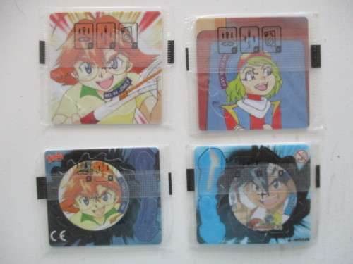 LOT OF 4 UNOPEND BEYBLADE SPINNER TAZOS