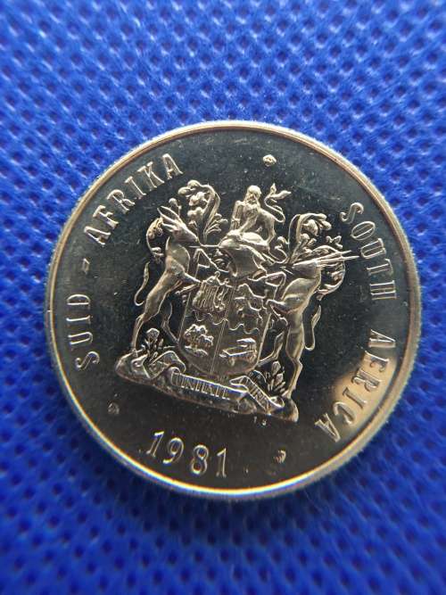 BEAUTFUL TONED R1 COIN  HAS SLIGHT BLUE HUE TO IT 1981 MIRROR IMAGE