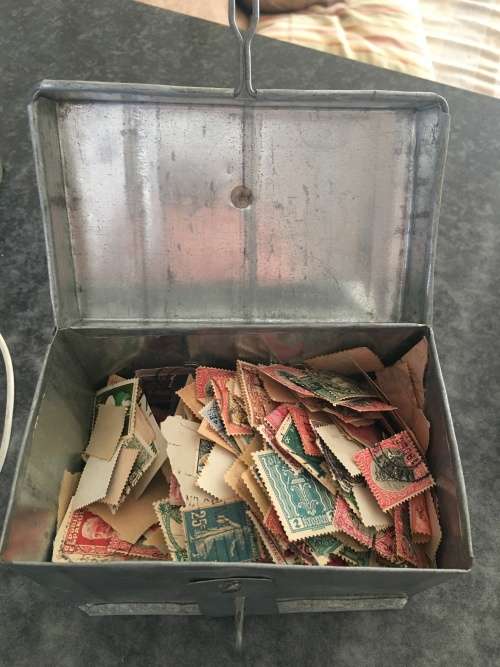 METAL BOX FULL OF OLD UNCHECKED STAMPS