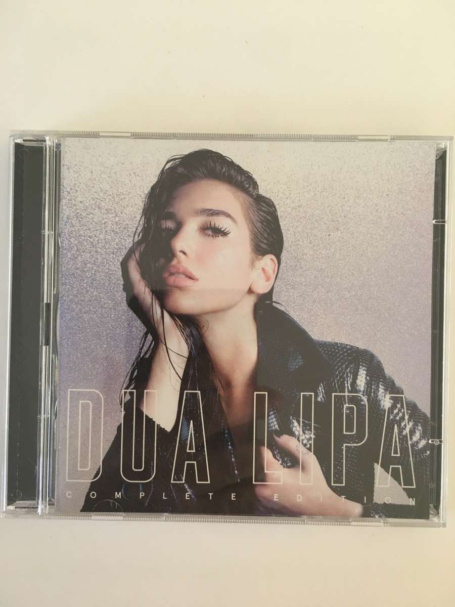 2 LOVELY MUSIC CD`S WOMAN II  AND DUA LIPA