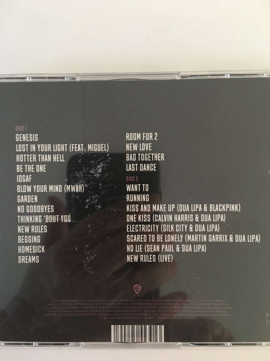 2 LOVELY MUSIC CD`S WOMAN II  AND DUA LIPA