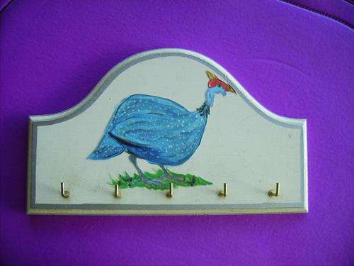 Guinea fowl key holder for keys