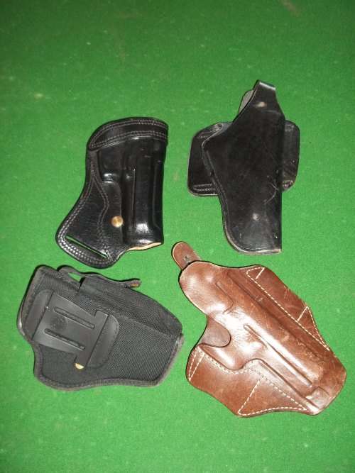 LOT OF 4 PISTOL HOLSTERS