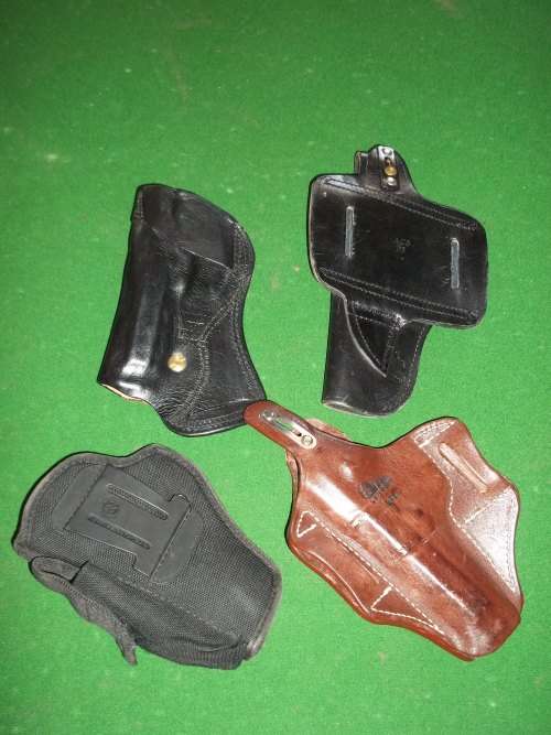 LOT OF 4 PISTOL HOLSTERS