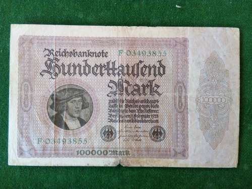 GERMANY 100 000 MARK 1923 .. FAIR CIRCULATED (EDGE DAMAGE)