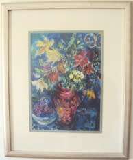 Flowers in red Urnvase with bowl of grapes