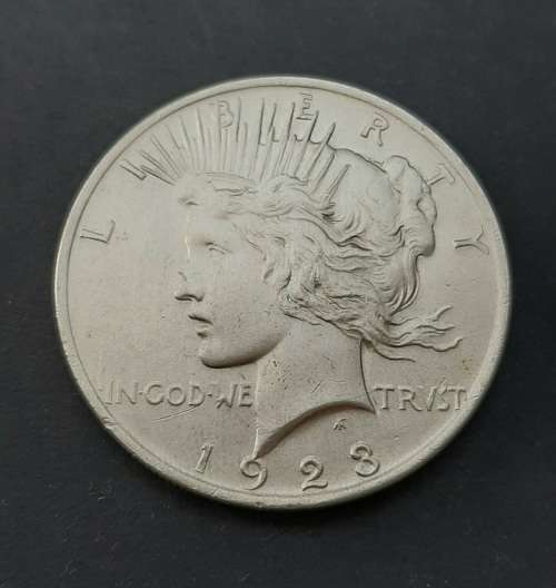 ** 1923 United States of America .900 Silver Peace Dollar (XF / VF) .**