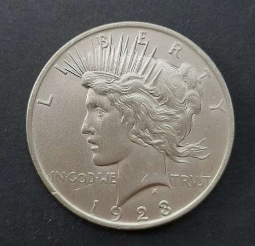 ** 1923 United States of America .900 Silver Peace Dollar (XF / VF) .**