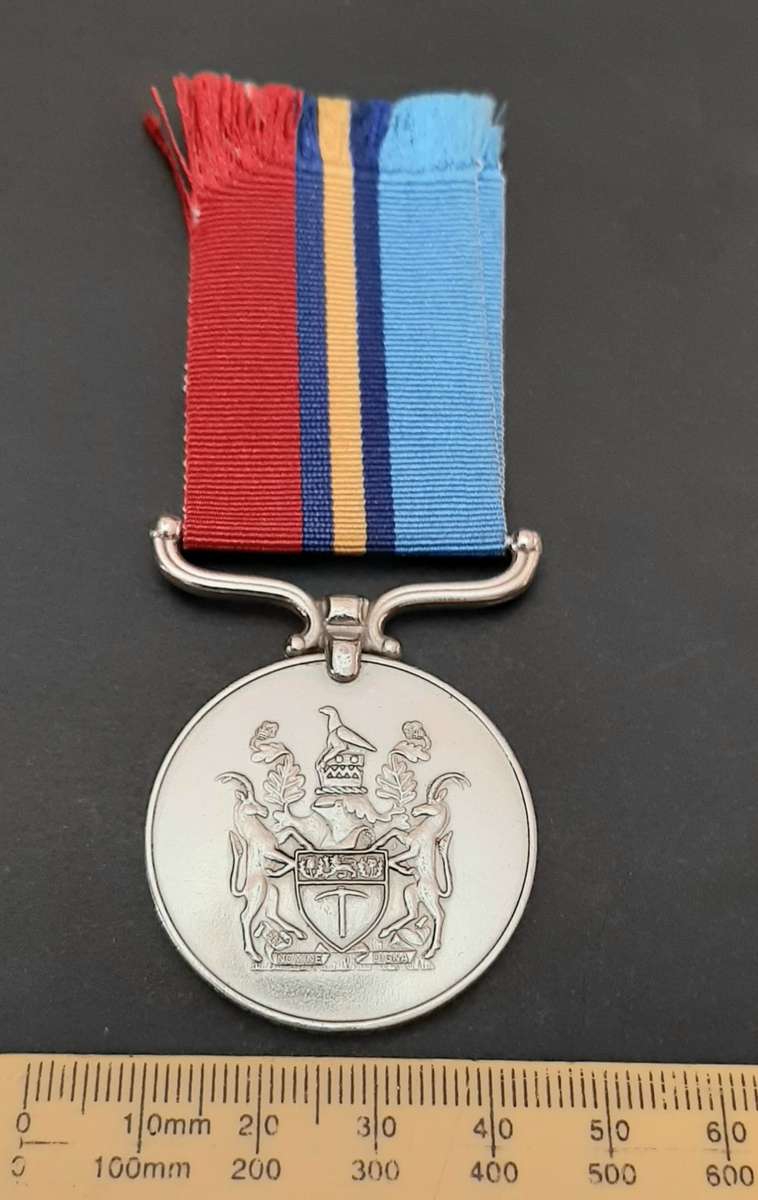 **1970s Rhodesian Bush War: General Service Medal att. Native Soldier ( Private Dube)**