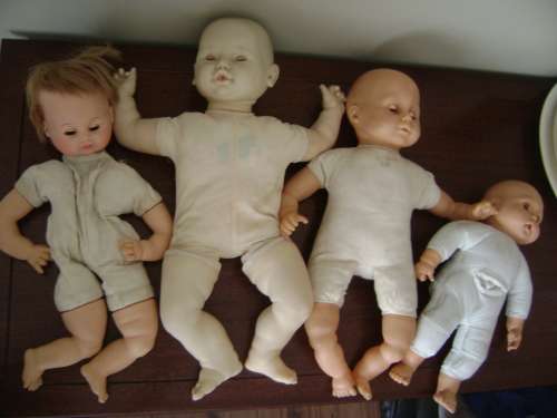 COLLECTION OF 4 VINTAGE BABY DOLLS (INCL. JESMAR ITALY, PRIMA AND JD PLATED MOULDS INC 1961)
