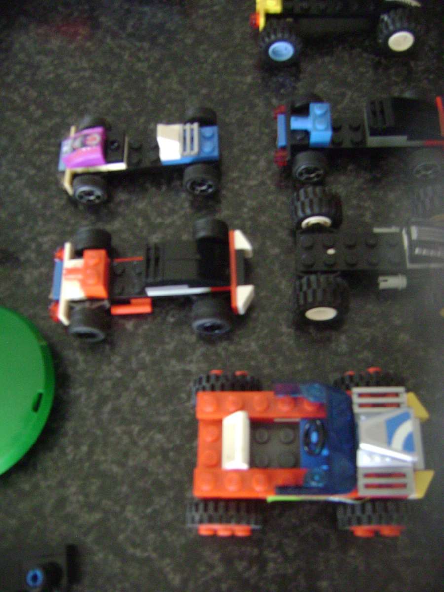 LEGO PIECES AND LITTLE CARS