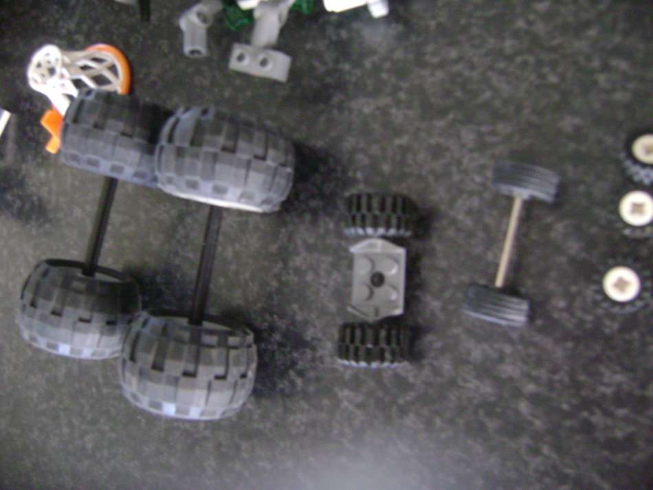 LEGO PIECES AND LITTLE CARS