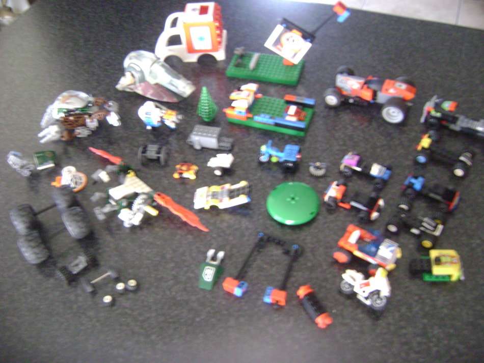 LEGO PIECES AND LITTLE CARS