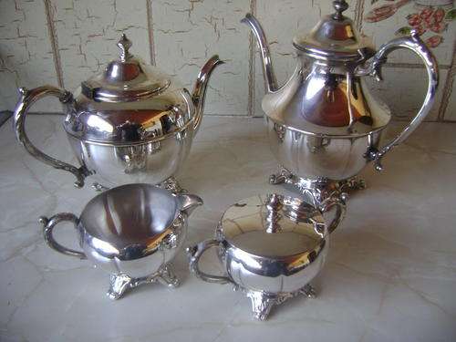 4 X PIECE SILVER PLATED TEA SET, E.P. COPPER LEAD MOUNTS - MADE IN CANADA.