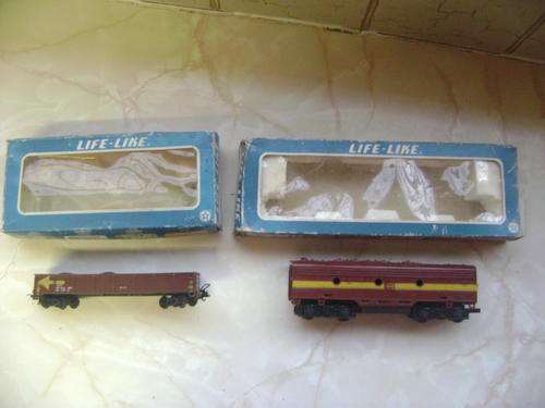 TWO LIFE LIKE TRAIN TRUCKS IN ORIGINAL BOXES - MADE IN HONG KONG