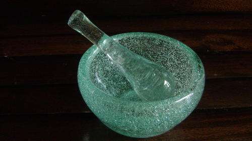 Mortar and pestle set in beautiful light green murano bubble glass