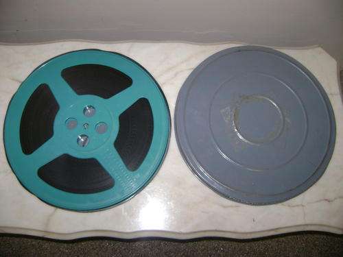 16 MM MOVIE IN ORIGINAL TIN HOLDER - CHAMPION OF FREEDOM