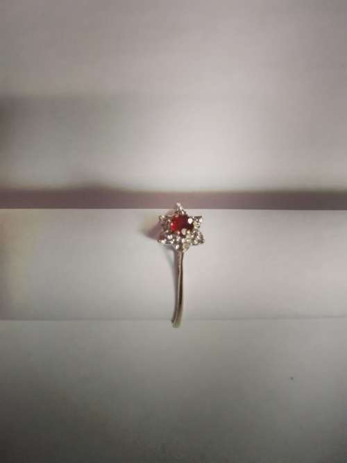 Ladies 9ct gold ring, red gem with diamantes; excluding shipping