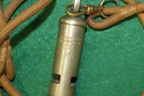 WW2 British Trench Whistle with lynyard dated 1943 and War Department mark (reduced price)