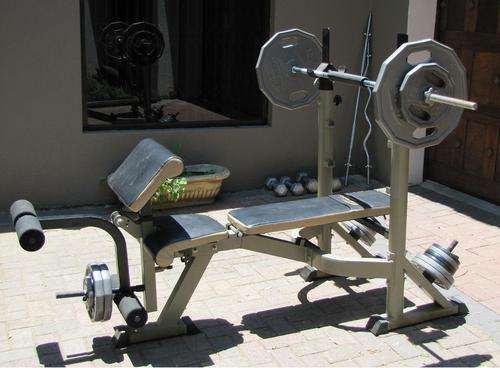 *MULTI PURPOSE EXCERSIZE BENCH - BRAND TROJAN - VERY GOOD CONDITION â LOADS OF WIEGHTS AND EXTRAS*