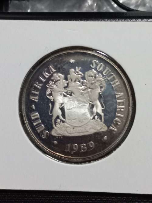 1989 SILVER R1 WITH NICE BLUE TONING..