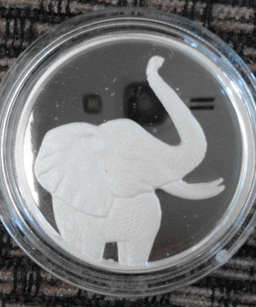 1 OZ 99.9 FINE SILVER COIN WITH ELEPHANT,BID FOR GOLD COIN!! NOT SILVER PLATED!!