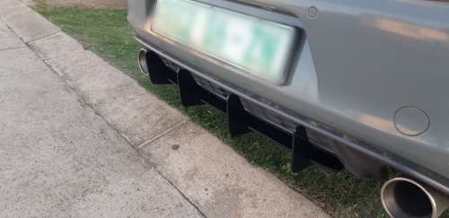 PLASTIC REAR BUMPER DIFFUSER (ADD-ON 4 PIN) (VW GOLF 6 / 7 / 7.5 GTI / R)