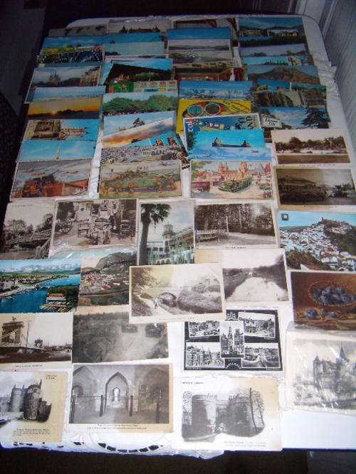 65 Old Postcards from around the worls - Some very old stamps, some unused cards