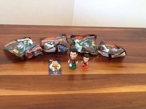 4 sealed Shell Headliners figurines plus 2 Louis Figo figurines