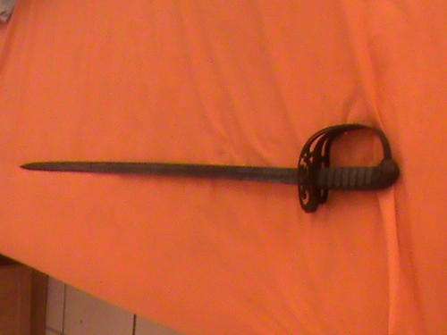 THE SWORD CAME WITH A RIFLE WESTLEY RICHARDS CO.LONDON 1937 AND ON THE SWORD IS WORDING SMALL YROVED