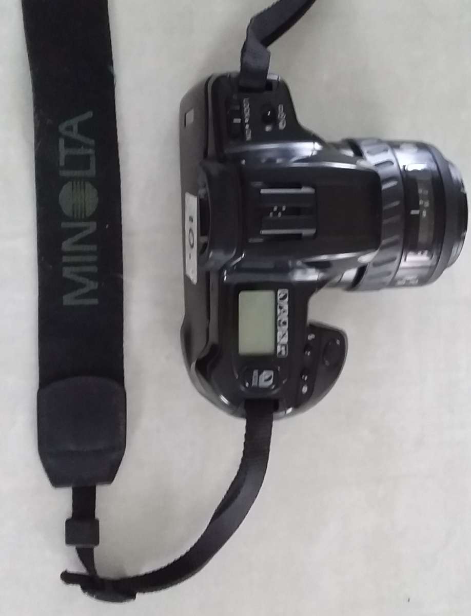 Minolta Dynax 300 si. FILM camera with 35 to 70 Zoom and auto focus and advance.