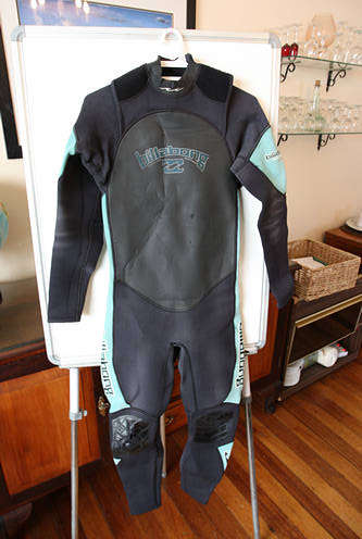 Old and worn Billabong wetsuit