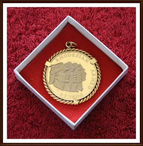 Rhodesia Medallion, of Rhod. Armed Forces, The Rims of the medallions are Gold Plated, as per Photo.