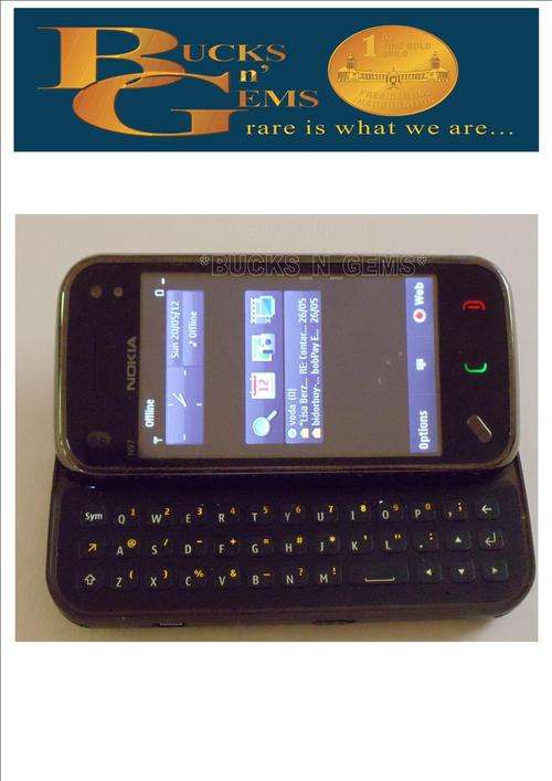 NOKIA N97 MINI -- USED PHONE WELL USED AND STILL WORKS FINE -- MIGHT NEED SOFTWARE UPGRADE