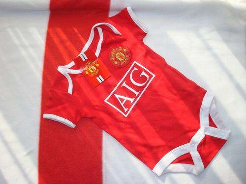 MANCHESTER UNITED BABY GROW 12-18 MONTHS