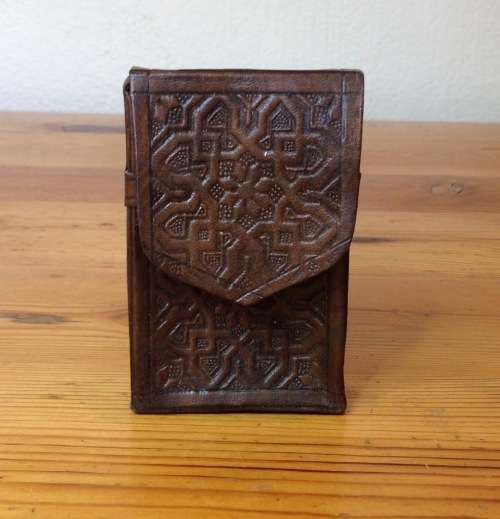 CIGARETTE BOX HOLDER=LEATHER=EMBOSSED=SOLD AS SEEN IN THE IMAGES.