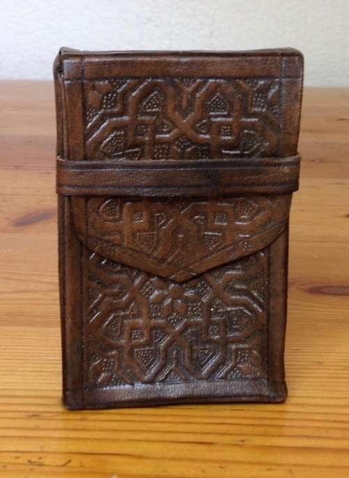 CIGARETTE BOX HOLDER=LEATHER=EMBOSSED=SOLD AS SEEN IN THE IMAGES.