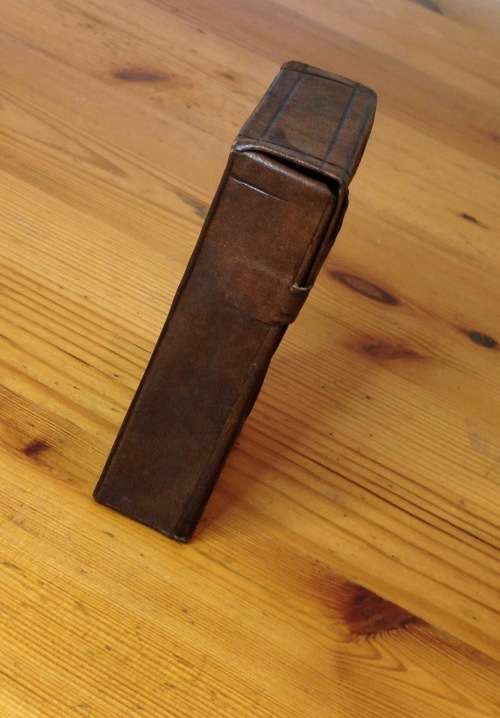 CIGARETTE BOX HOLDER=LEATHER=EMBOSSED=SOLD AS SEEN IN THE IMAGES.