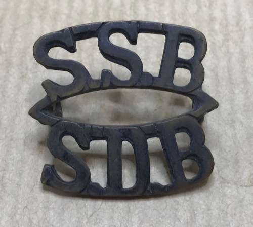 SADF BADGE=WWII SPECIAL SERVICE BATTALION TITLE BADGE=WORLD WAR TWO=BRASS.