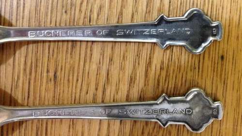 SILVER PLATED souvenir TEASPOONS x 2=BUCHERER of SWITZERLAND=LUCERNE=ROLEX WATCHES PROMOTION SPOONS!