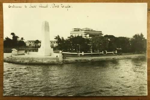 POSTCARD POST CARD REAL PHOTO EGYPT SUEZ CANAL ENTRANCE PORT TEWFIK (TAWFIQ) MEMORIAL BLACK + WHITE.