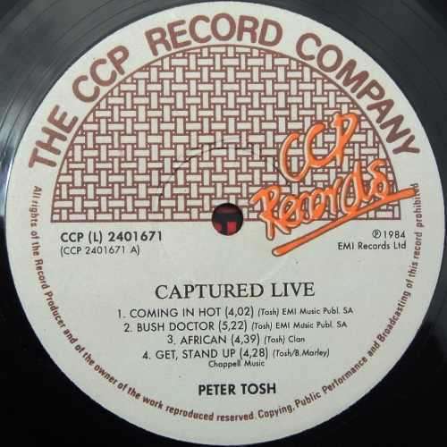 Peter Tosh - CAPTURED LIVE.  Vinyl 33 rpm LP album. (VG+/VG). Scarce S A release. (1984).