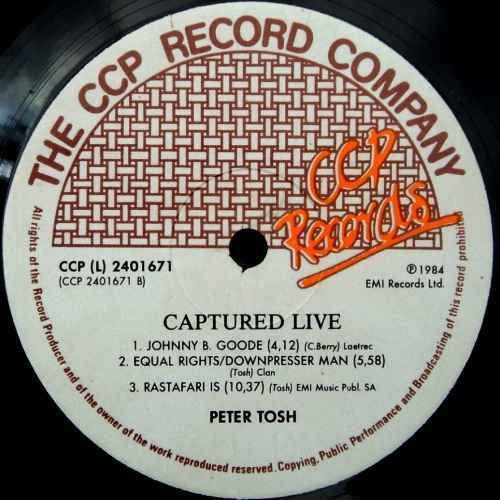 Peter Tosh - CAPTURED LIVE.  Vinyl 33 rpm LP album. (VG+/VG). Scarce S A release. (1984).