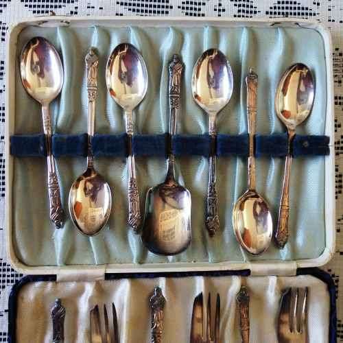 BOXED SET OF MATCHING E.P.N.S. APOSTLE TEASPOONS (6), CAKE FORKS (6) AND SUGAR SPOON. 1930s / 40s.