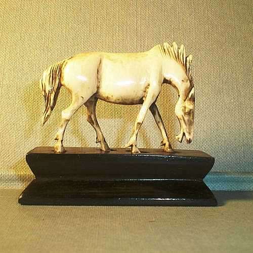 HORSE FIGURINE carved from Elephant Ivory.