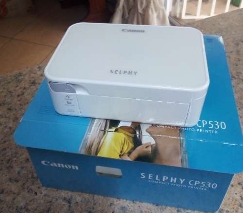 Canon Selphy CP530 printer. New. Everything in original packaging.