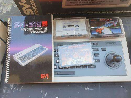 Spectravideo SV 318 and cassette recorder in original packaging.