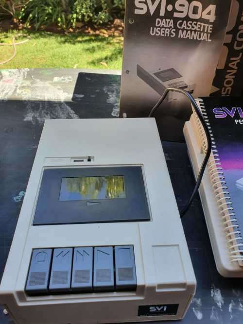 Spectravideo SV 318 and cassette recorder in original packaging.