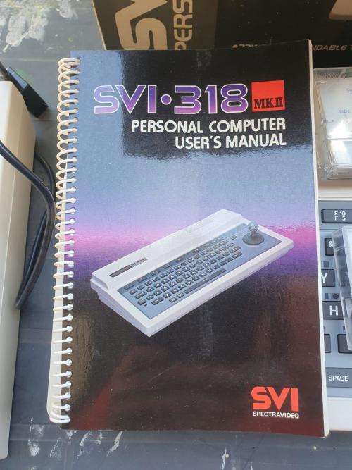 Spectravideo SV 318 and cassette recorder in original packaging.